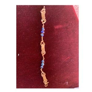 Hand-made bracelet made from natural materials.